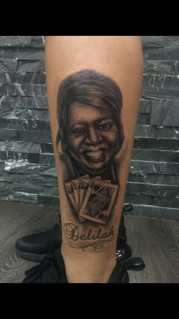 A memorial tattoo of a woman with playing cards, symbolizing family ties and the art of choosing the right design and style.