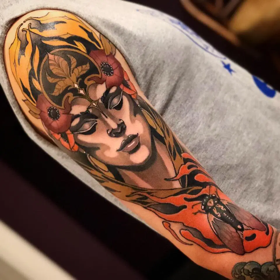 A neotraditional tattoo of a woman with a tiger on her sleeve.