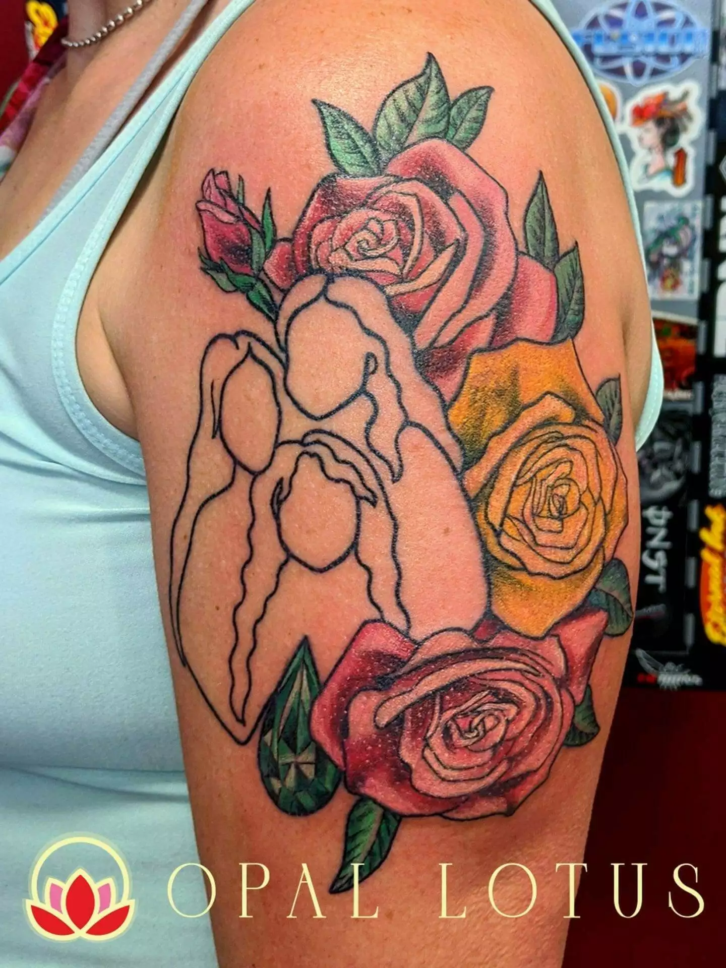 A tattoo of a floral woman on her arm.