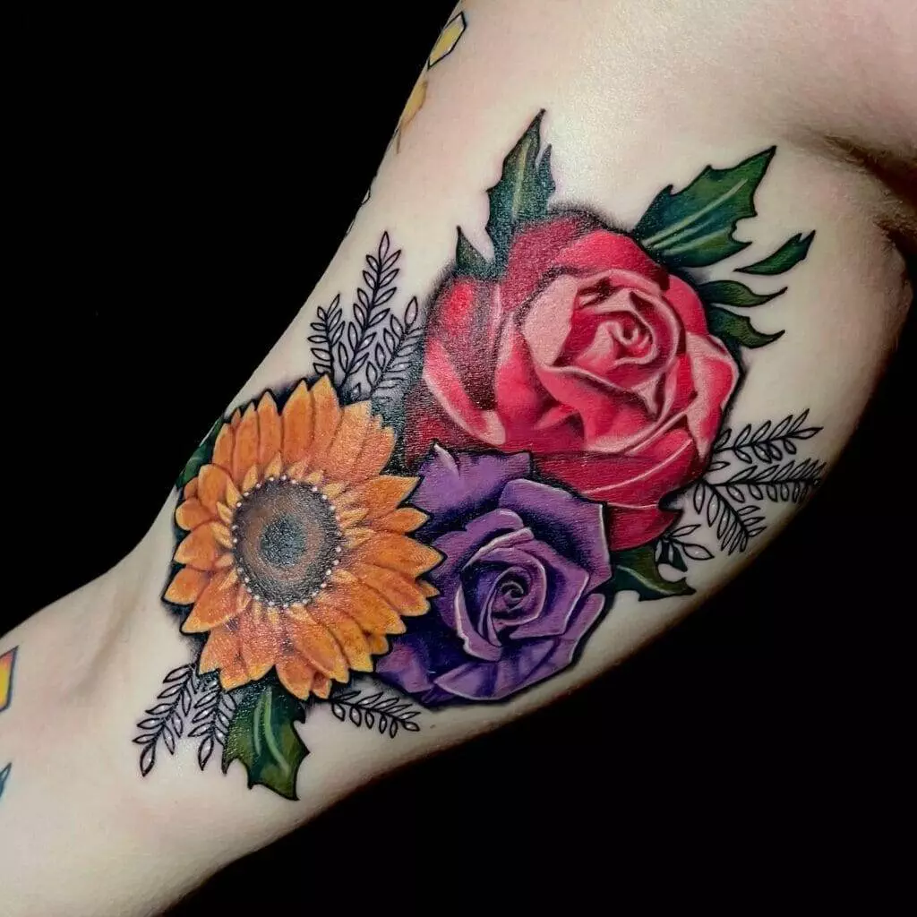 Colorful tattoo, roses, sunflowers.