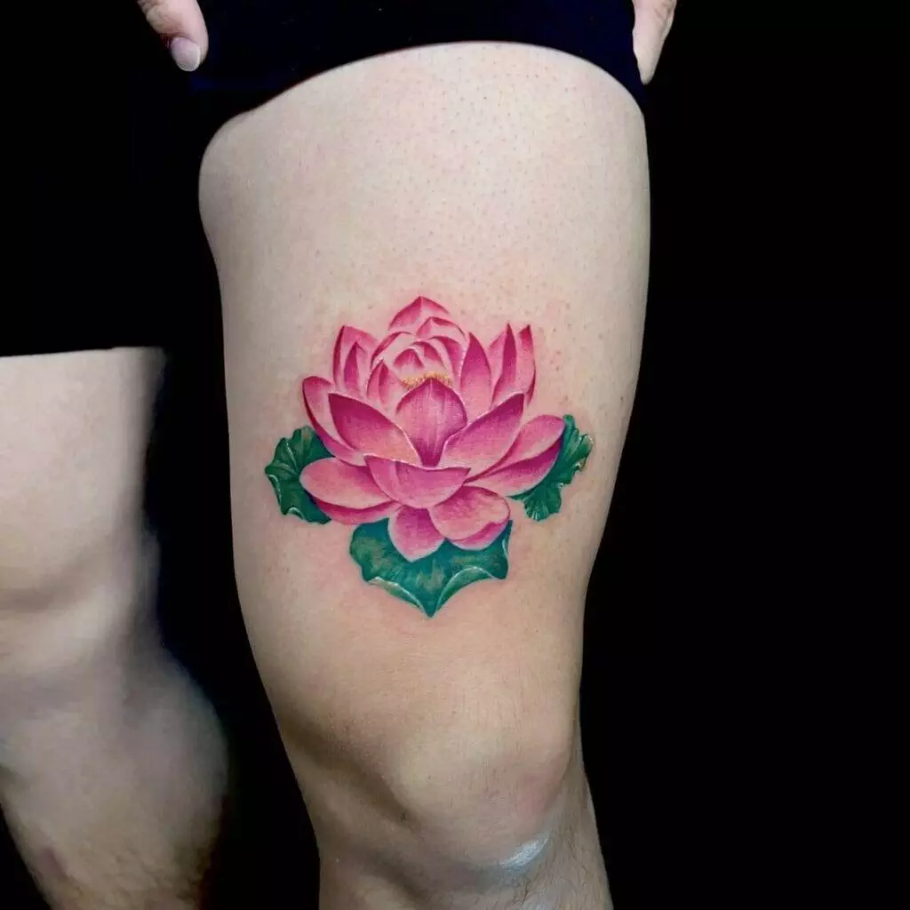 Pink lotus flower, tattoo, man's thigh