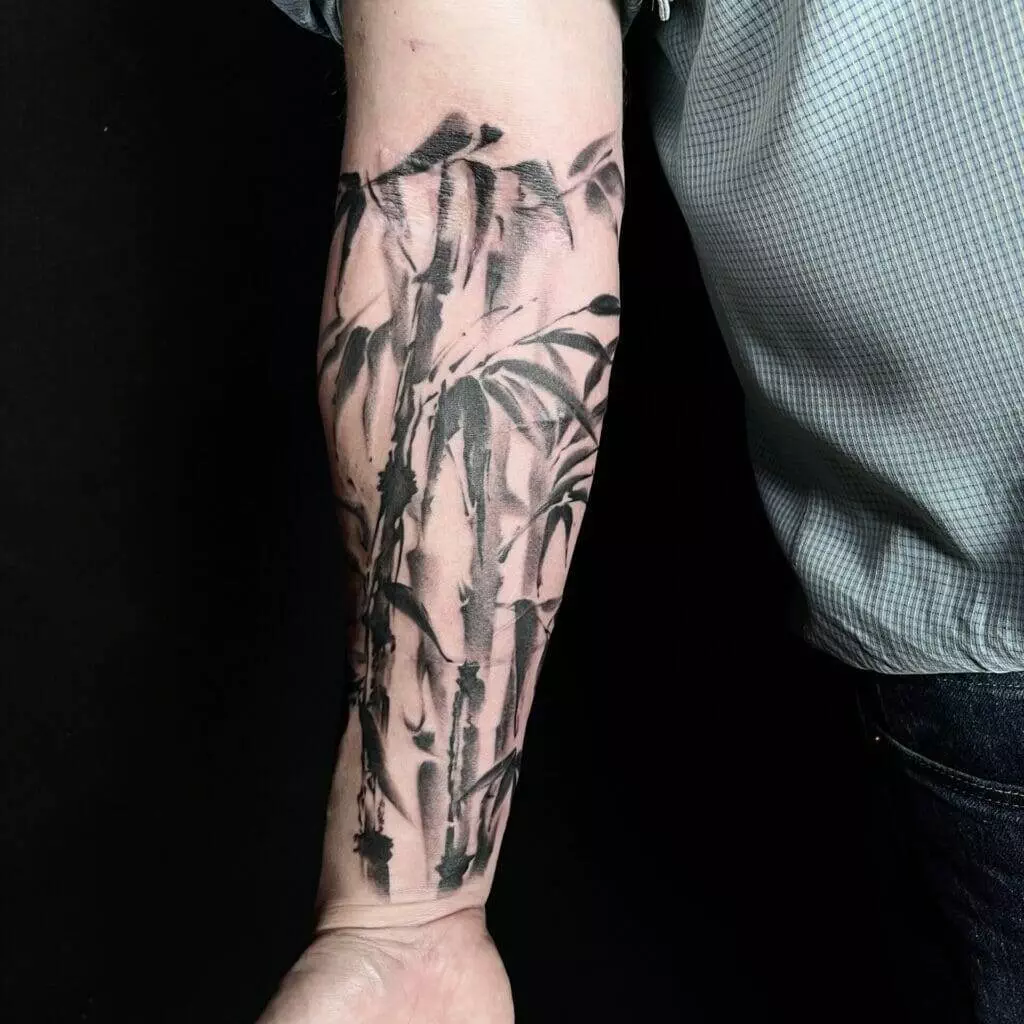 Bamboo trees tattoo, forearm.